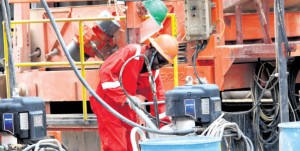 A worker at the Ngamia 1 oil rig in Turkana County